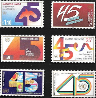 Six United Nations anniversary postage stamps displayed on a black background