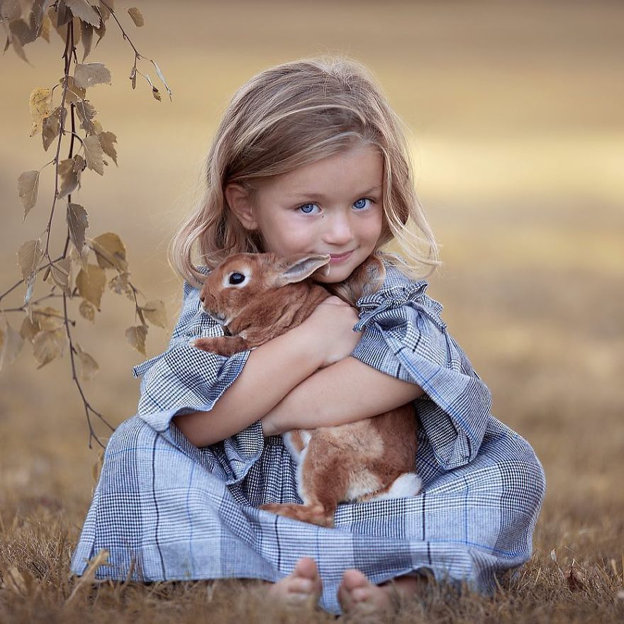 Girl Holding Brown Rabbit