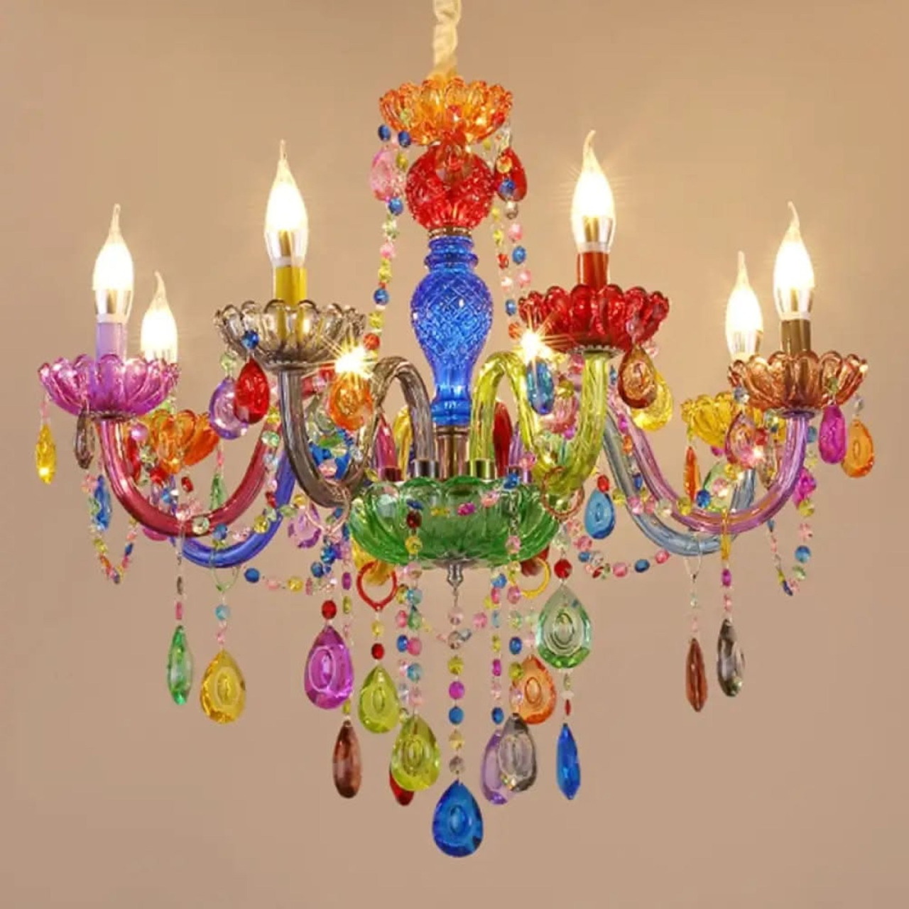 Multicolored glass chandelier with crystal pendants and candle bulbs