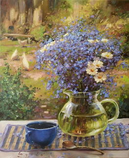 Oil painting of blue flowers in glass teapot with blue cup on table