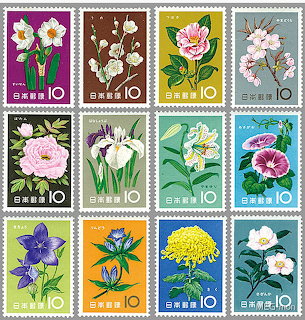 Grid of twelve vintage Japanese flower postage stamps with colorful botanical illustrations