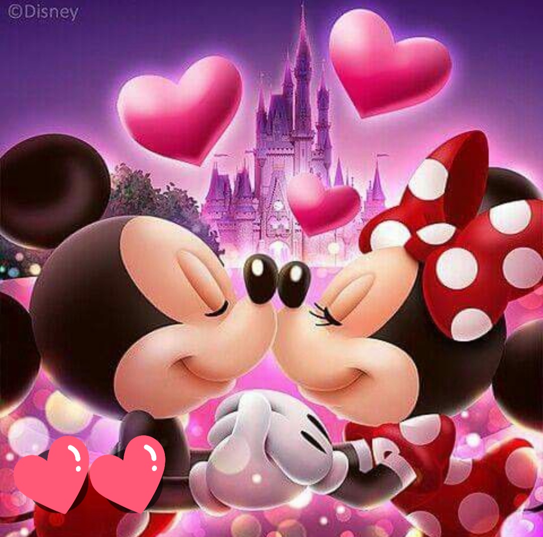 Minnie Mouse and Mickey Mouse kissing with pink hearts and a castle in the background