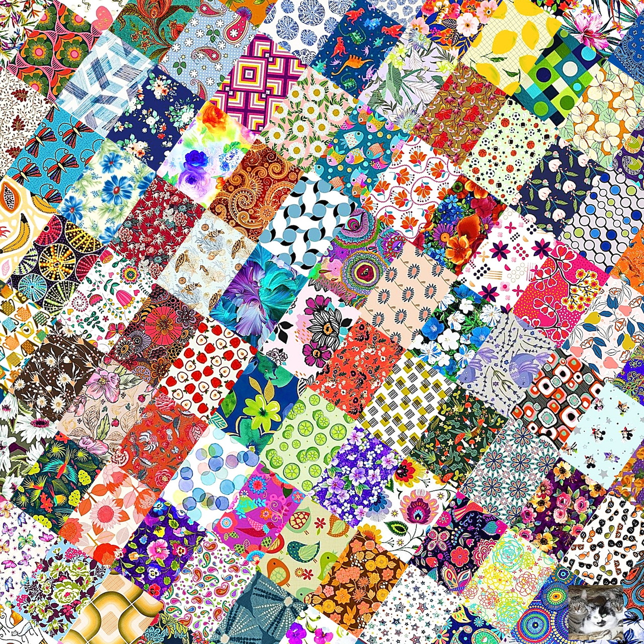 Colorful patchwork quilt with geometric patterns, florals, dots, and abstract designs in various bright colors