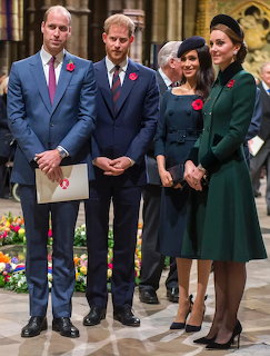 Prince William, Prince Harry, Meghan Markle and Kate Middleton standing at a formal indoor event