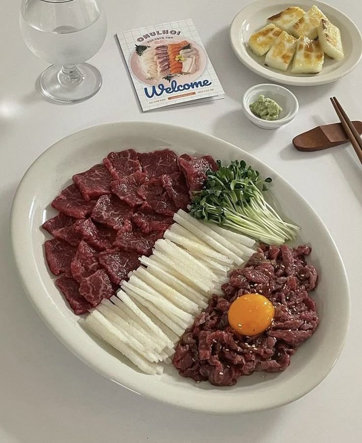 Overhead view of assorted Korean food dishes with rice and kimchi
