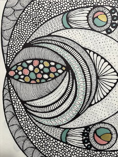 Black and white zentangle doodle art with swirling lines, dot patterns, and small colorful accents