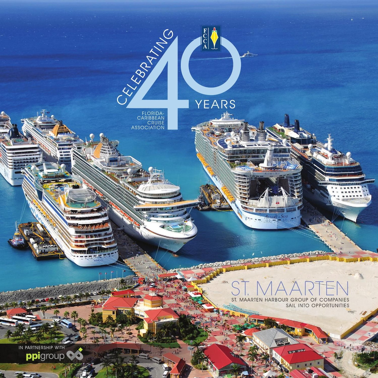 Aerial view of cruise ships docked at St. Maarten port in turquoise water with colorful buildings on shore