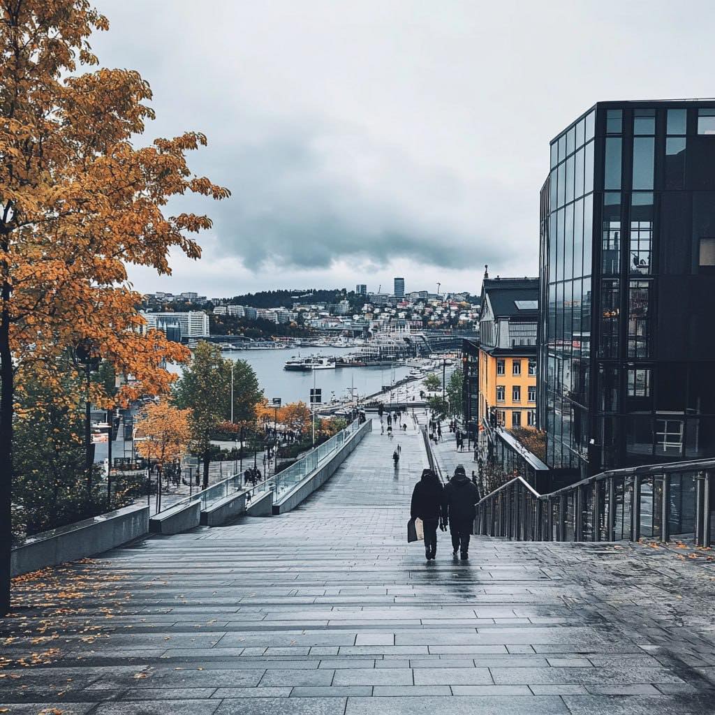 Pedestrians walking down a wet Oslo street with autumn trees and harbor view
