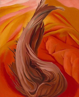 Painting of a twisted bare tree trunk against orange and pink abstract desert hills