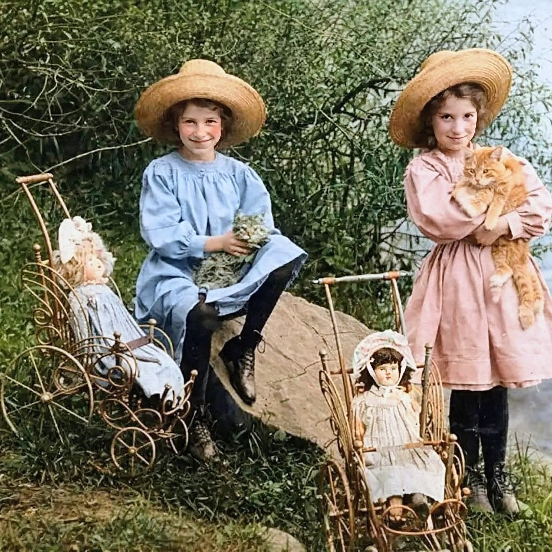 Girls with Cats and Dolls