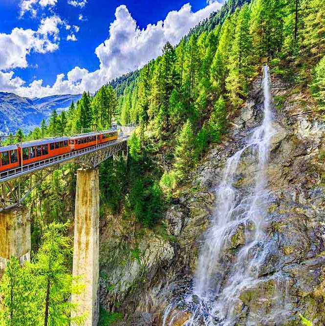 Train by Waterfall