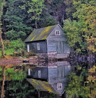 Norwegian Boathouse Reflection