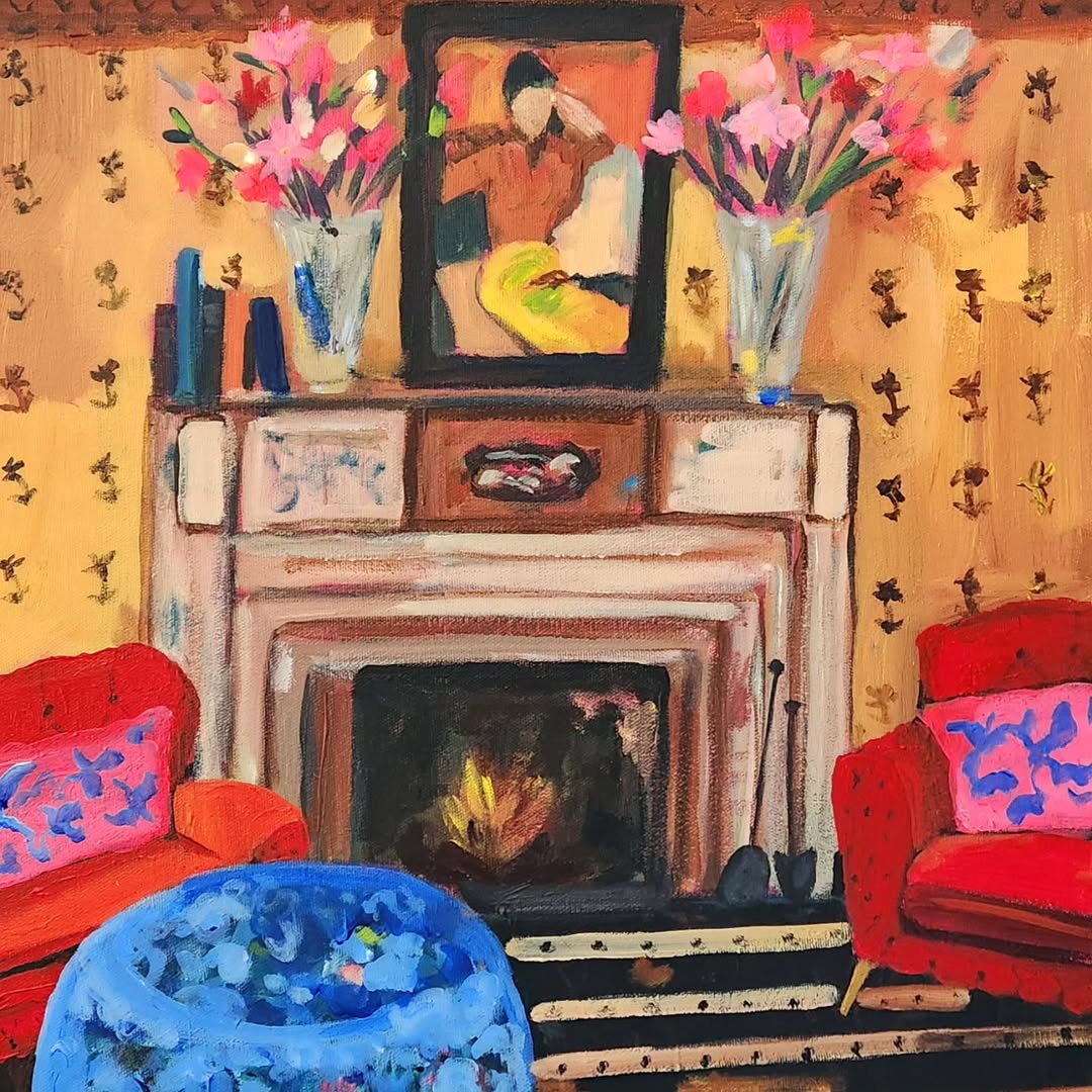 Painting of living room with fireplace, vases of flowers, red chairs, and blue ottoman against yellow patterned wallpaper