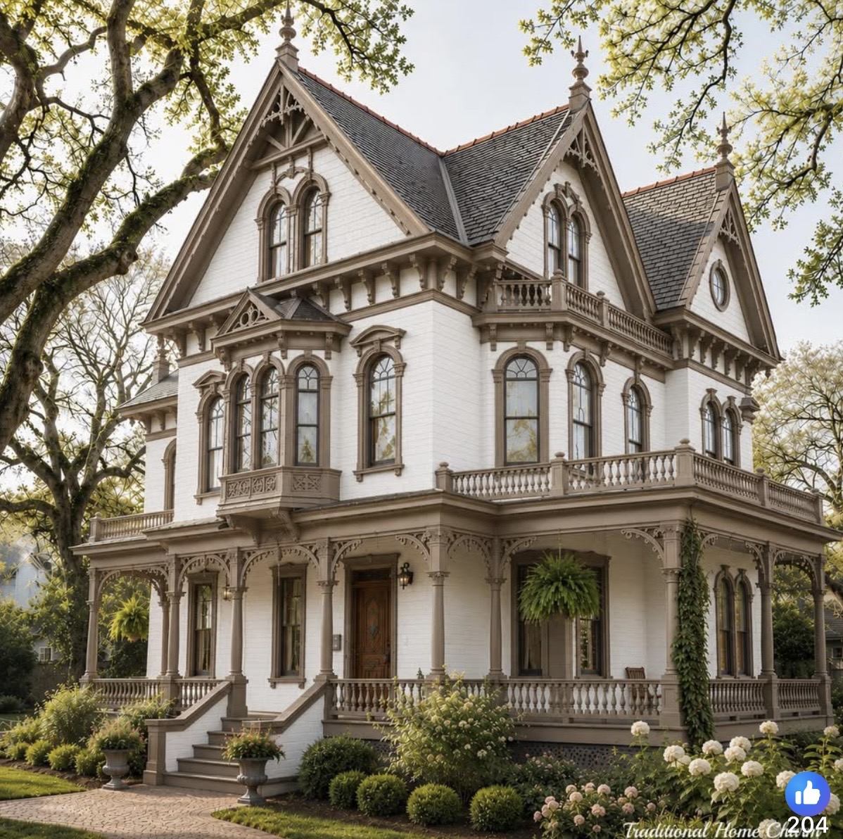 White Victorian mansion with decorative balconies and gabled roof surrounded by green gardens and trees