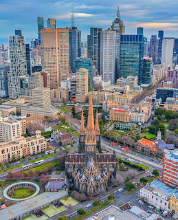 Aerial view of Melbourne city with St Paul's Cathedral and skyscrapers in the background
