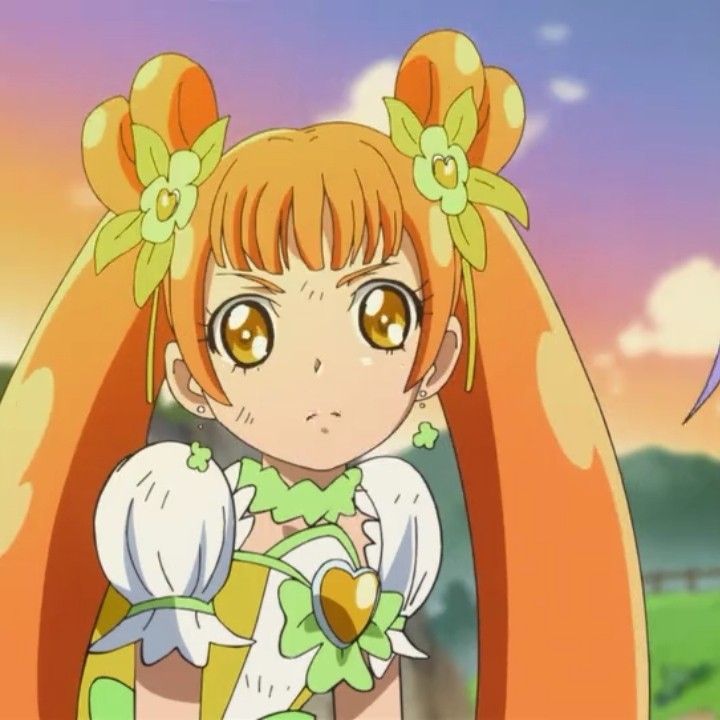 Anime girl Cure Rosetta with orange twin tails, flower clips, and a white outfit