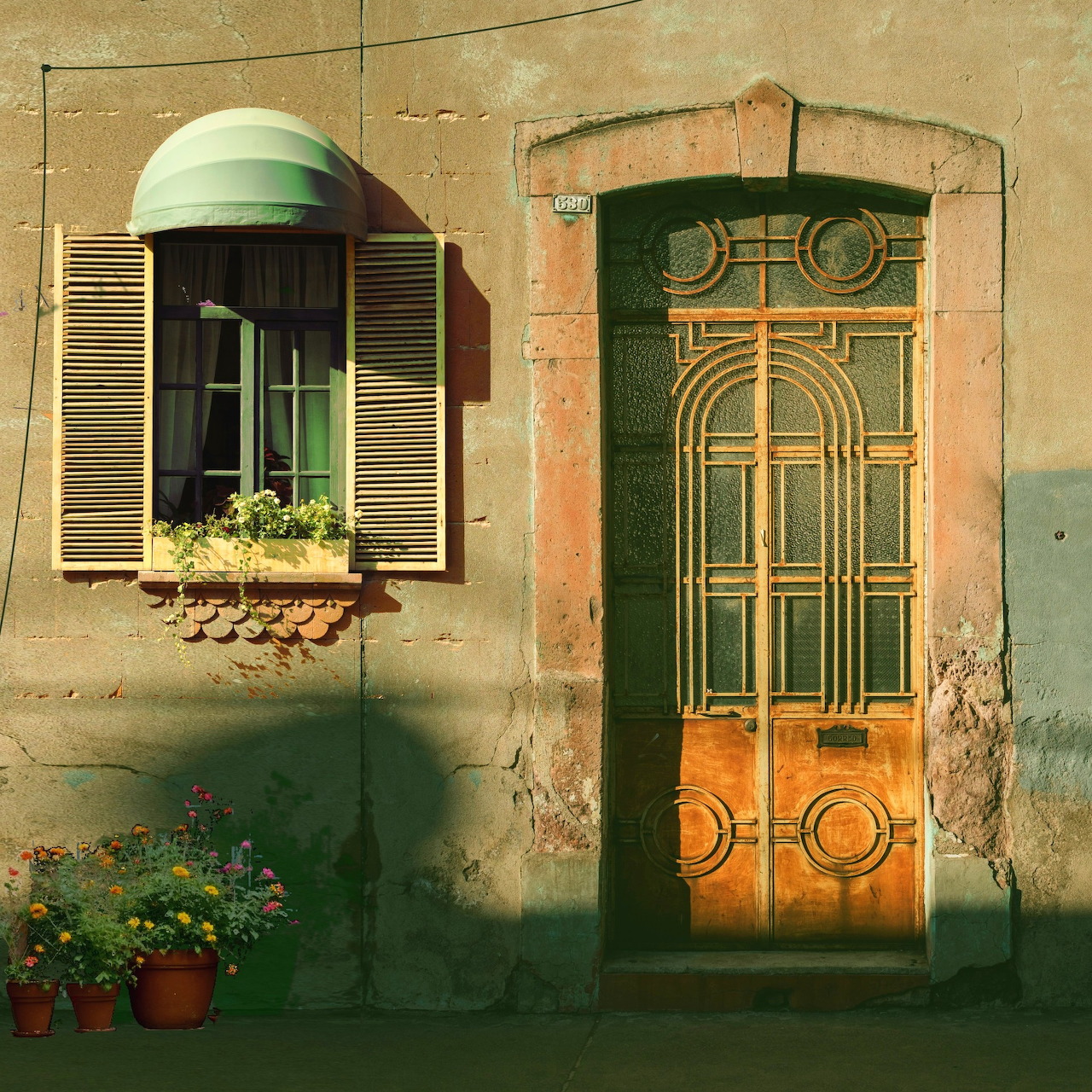 Ornate Green Door with Window