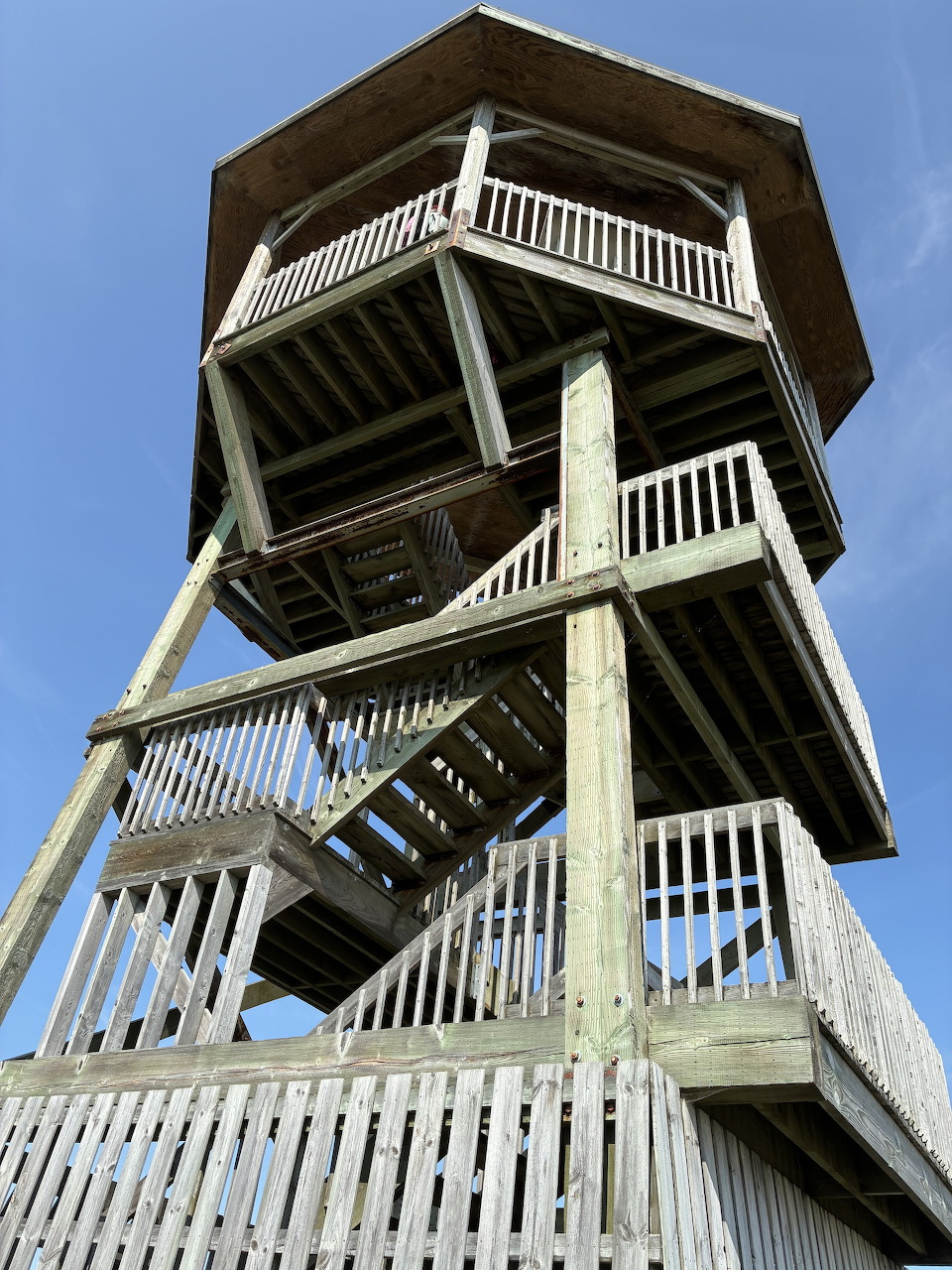Modern sea observation tower by the coast under an open sky