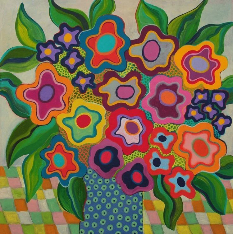 Colorful stylized flowers and green leaves in a blue patterned vase
