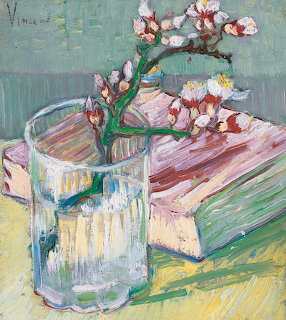 Van Gogh still life painting of pink almond blossoms in glass vase with book
