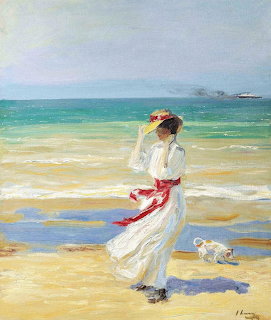 Impressionist painting of woman in flowing white dress walking on beach with small white dog, ocean in background