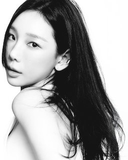 K-pop singer Taeyeon portrait from Panorama album cover