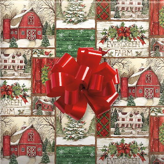 Red gift bow on Christmas wrapping paper with patchwork farm scenes and holiday motifs