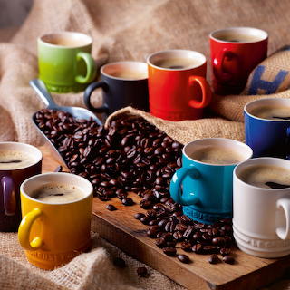 Colorful Coffee Mugs with Beans