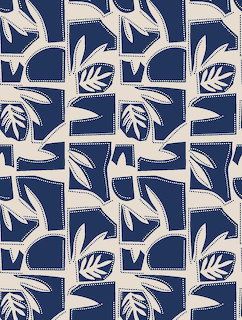 Repeating blue and white pattern with stylized leaf motifs in rectangular blocks on cream background