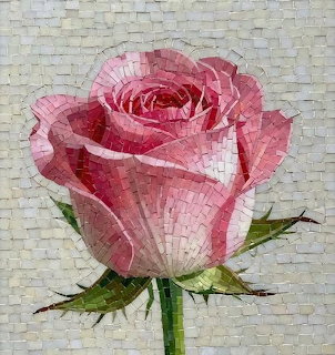 Pink rose created from small mosaic tiles with green stem against light gray tiled background