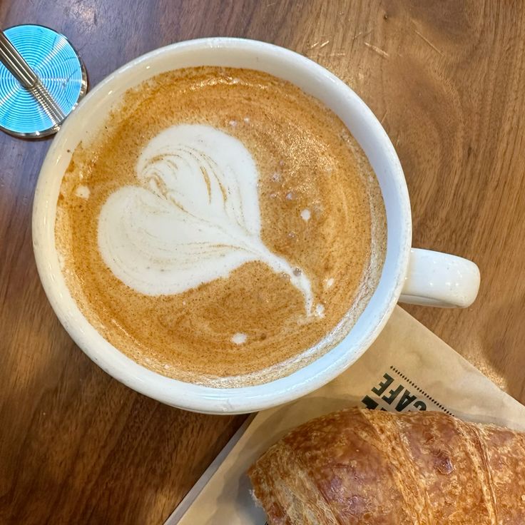 Latte Heart Art and Croissant