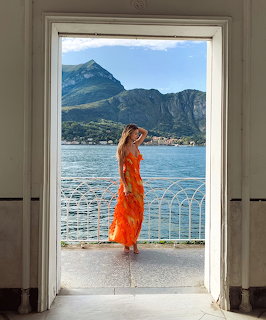 Woman at Italian Lake Balcony