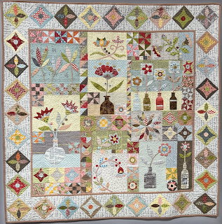 Sampler Quilt with Houses and Flowers