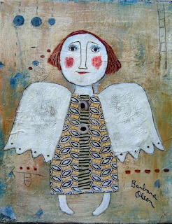 Folk art painting of an angel with white wings, red hair and a patterned dress