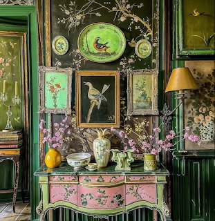 Ornate vintage room corner with floral-painted cabinet, framed art, lamp, and decorative vases