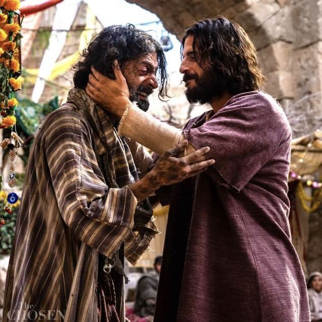 Two Men Embracing
