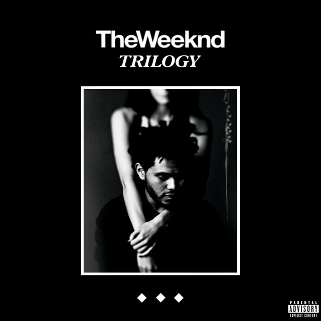 Dark album cover of The Weeknd Trilogy showing a man being embraced by a woman against a black background