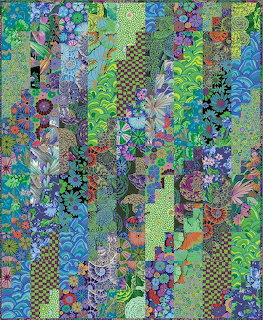 Colorful patchwork quilt with vertical strips of floral and geometric patterns in blue and green