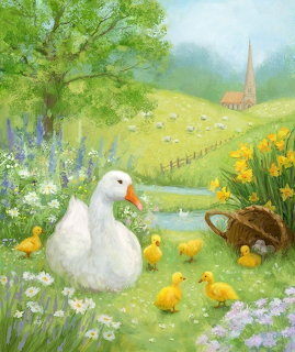 White duck with yellow ducklings by pond in spring landscape with flowers and church