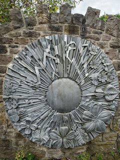 Metal Shield Flowers Wall