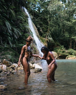 Women at Tropical Waterfall