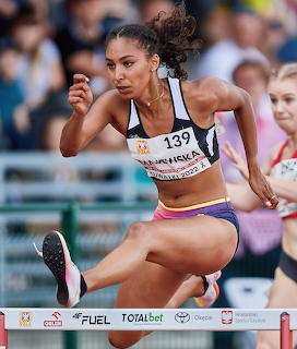 Woman Hurdler in Competition