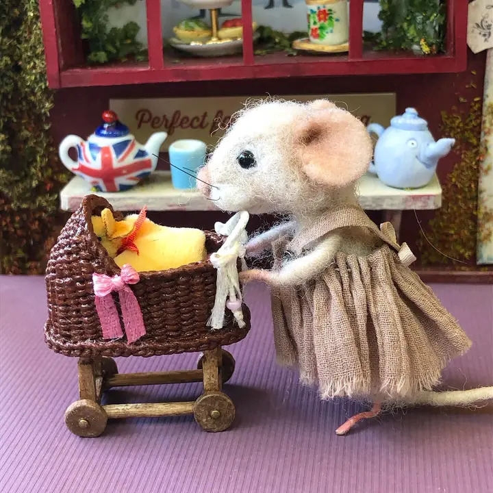 Mouse Pushing Duckling in Stroller