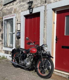 Red Hunter Motorcycle Outside Pub