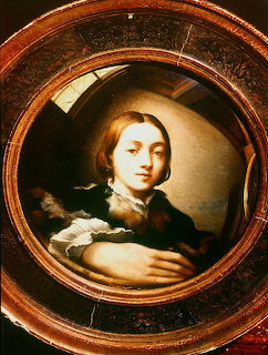 Parmigianino self-portrait in a convex mirror with a large hand and circular wooden frame