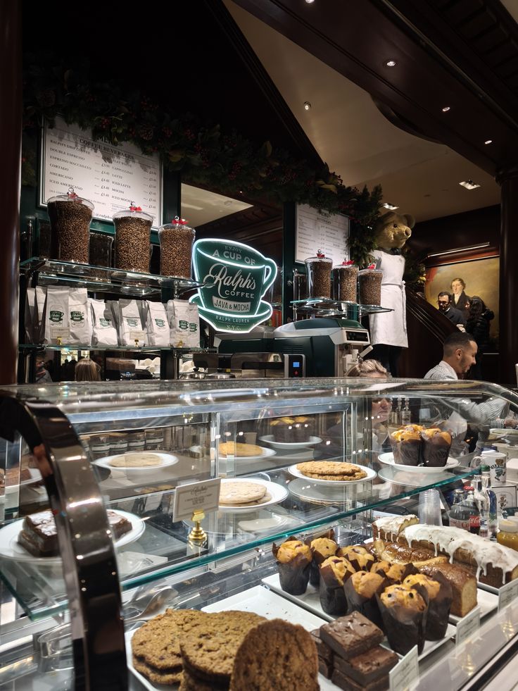 Ralph Lauren café interior in London with glass display counter of pastries, cookies, and baked goods