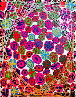 Colorful abstract egg with geometric circles surrounded by radiating lines and mosaic patterns