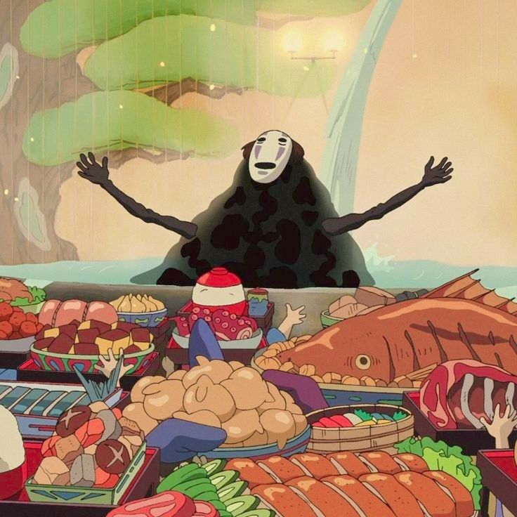 No-Face behind a table piled with food, fish, and dishes in an anime scene