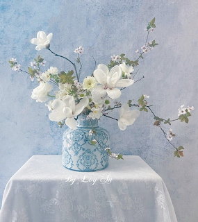 White Flowers Blue Vase
