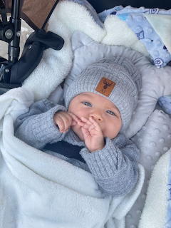 Baby in Gray Knit Outfit